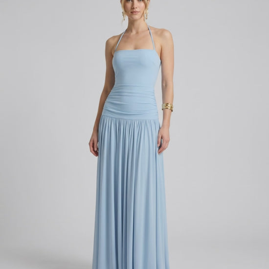 Elara Maxi Dress in light blue, featuring stretchy jersey, halter neck, and a fluid silhouette for effortless elegance by Lauven.