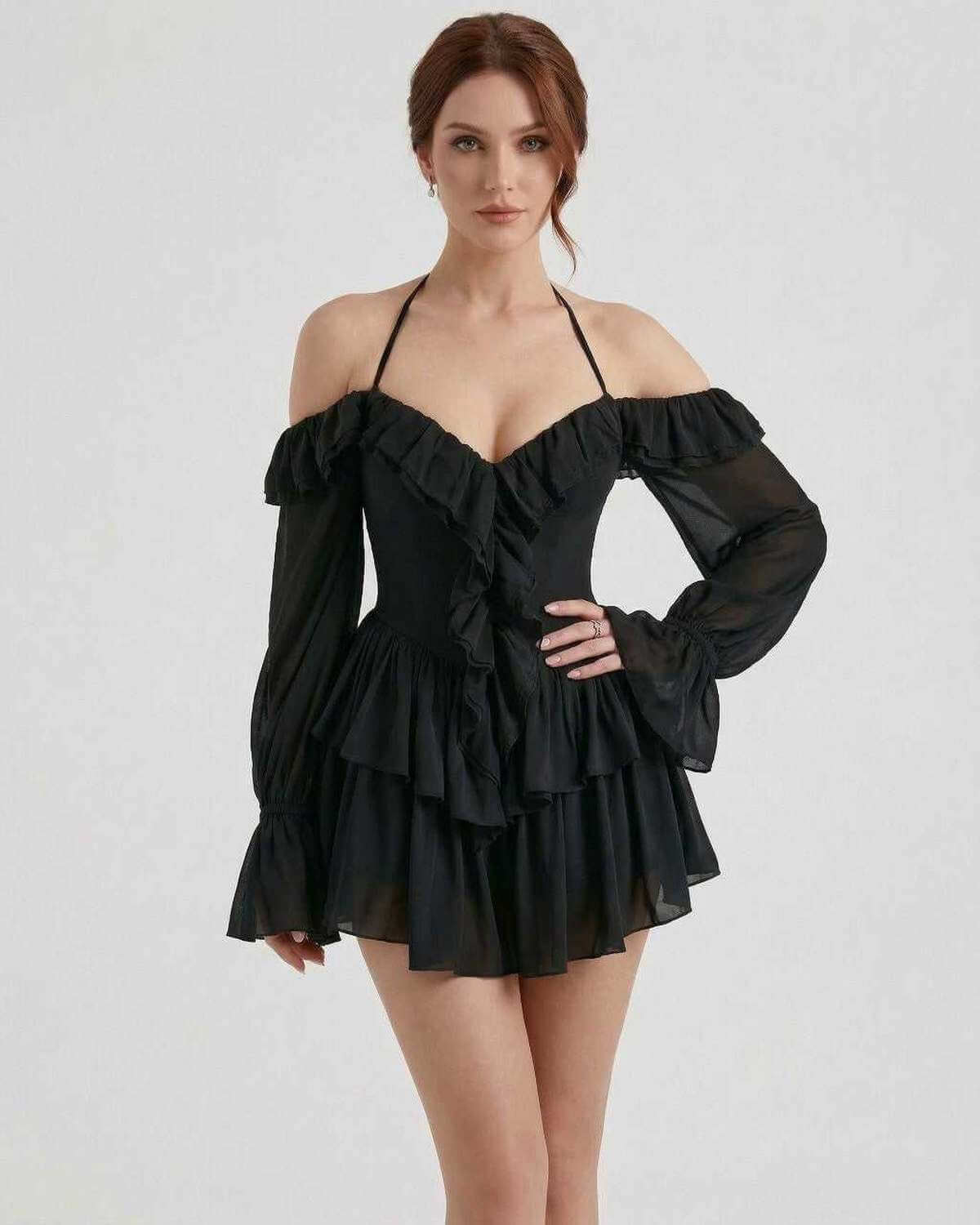 Ravelle Mini Dress by Lauven - Black halter ruffle mini dress with sheer sleeves and layered details.