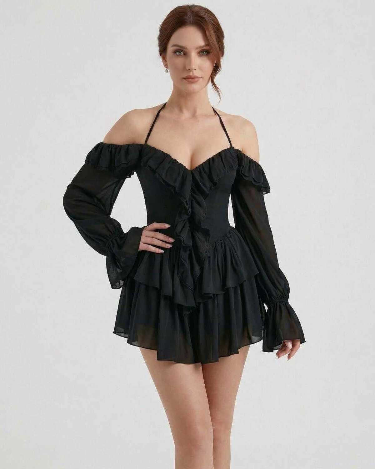 Ravelle Mini Dress by Lauven: Black halter ruffle mini dress with sheer sleeves and soft layered details.