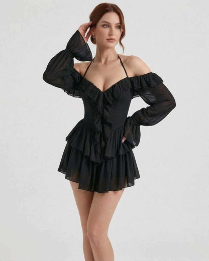 Ravelle Mini Dress by Lauven, black halter ruffle mini dress with sheer sleeves and flattering silhouette.
