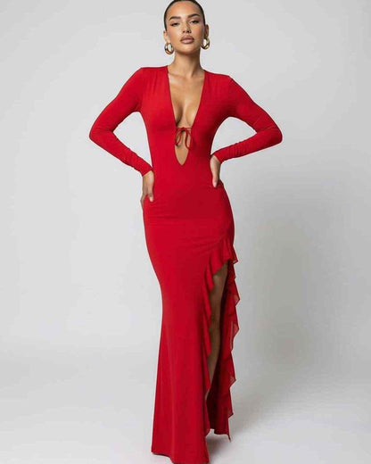 Valencia Maxi Dress in red featuring a deep V-neck, ruffle slit detail, and long sleeves by Lauven.