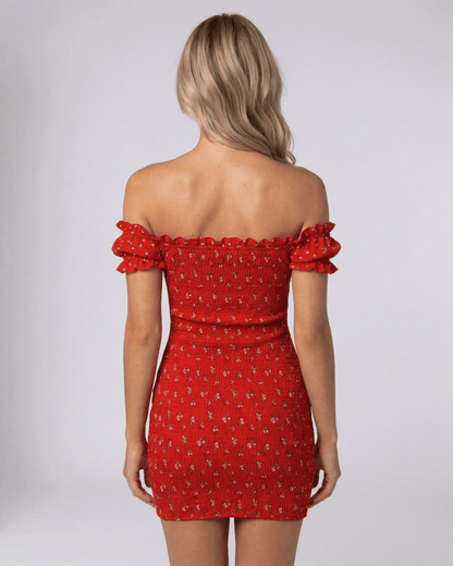 Back view of the Rosalia Mini Dress by Lauven, featuring red floral design and off shoulder neckline.