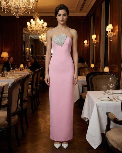 Rosalind Maxi Dress by Lauven, a pink strapless sheath dress with embellished heart detail, perfect for elegant occasions.