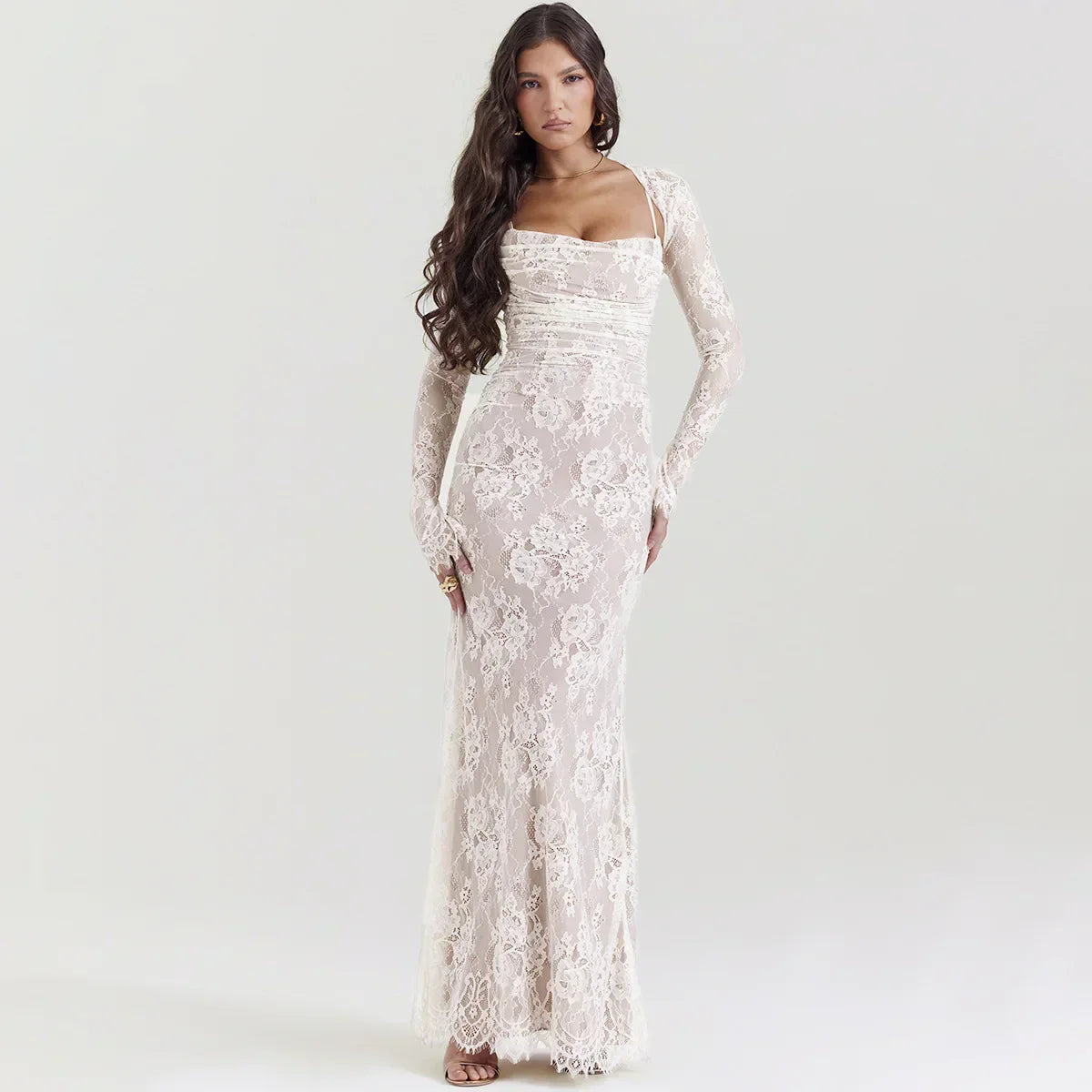 Elegant lace maxi dress in soft cotton blend with long sleeves, perfect for weddings or formal occasions.
