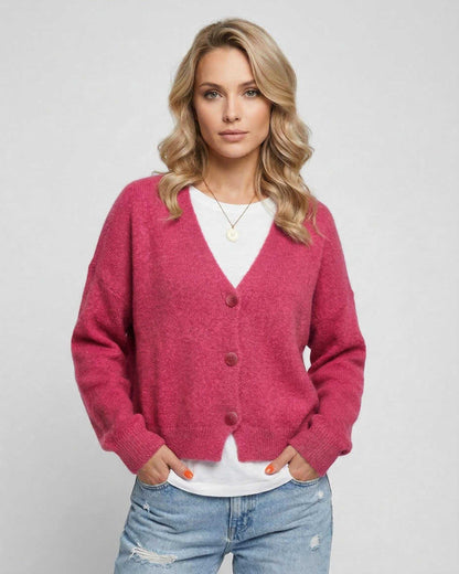 Rosea Cardigan in vibrant pink by Lauven, featuring relaxed fit and button-down front, perfect for modern style.