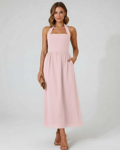 Roselle Midi Dress - Blush Pink Halter Midi Dress by Lauven, featuring soft A-line elegance and a flattering silhouette.