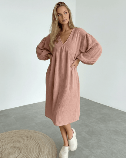 Roselle Midi Dress in dusty rose cotton, featuring puff sleeves and a v neck, offering feminine elegance by Lauven.