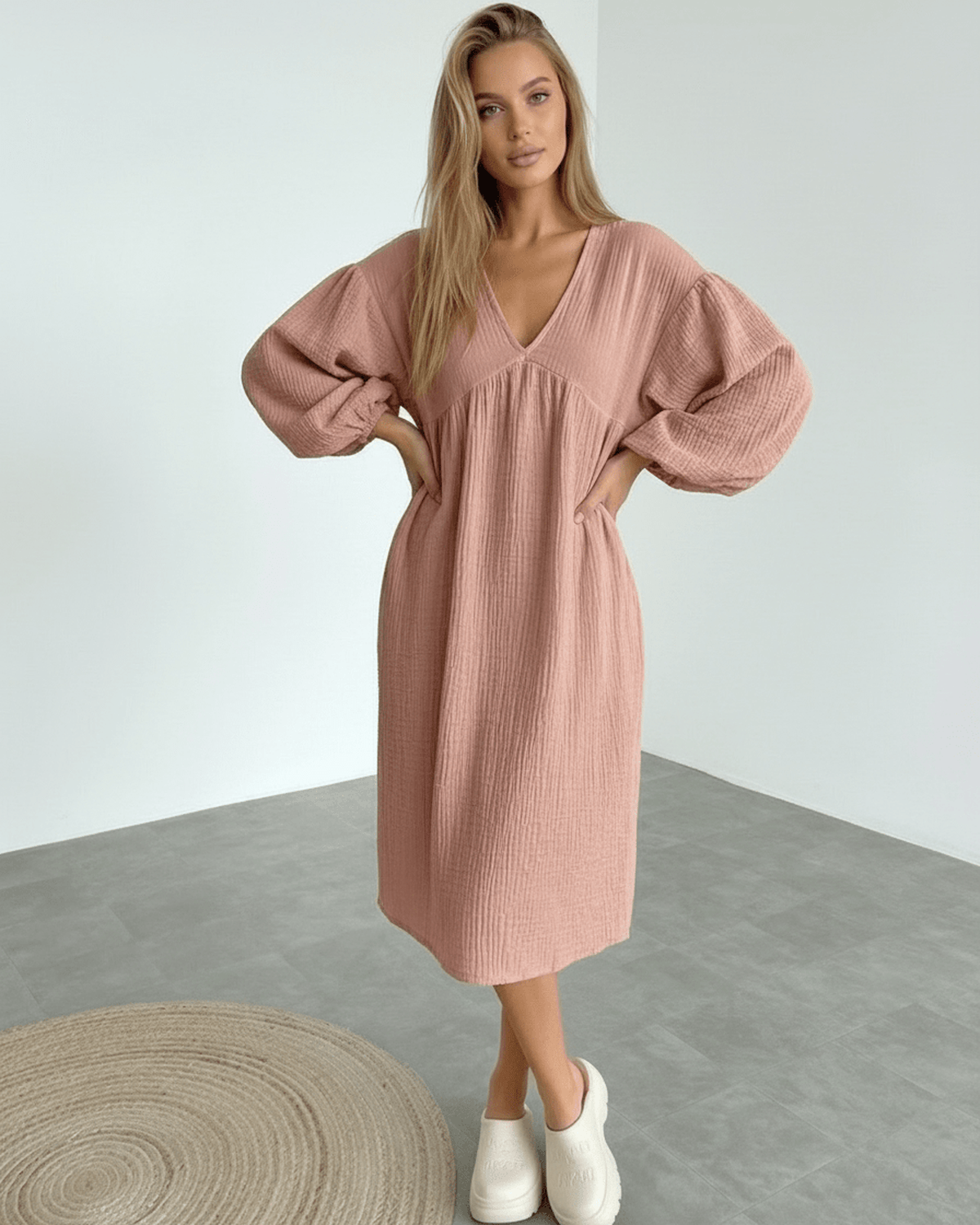 Roselle Midi Dress in dusty rose cotton, featuring puff sleeves, airy texture, and modern silhouette from Lauven.