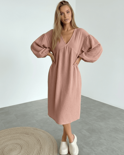 Roselle Midi Dress in dusty rose cotton, featuring puff sleeves, airy texture, and modern silhouette from Lauven.