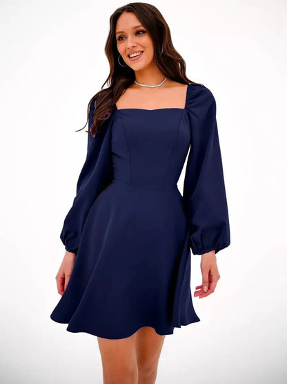 Navy blue Royal Puff mini dress with long sleeves and square neckline, perfect for weddings and special occasions.