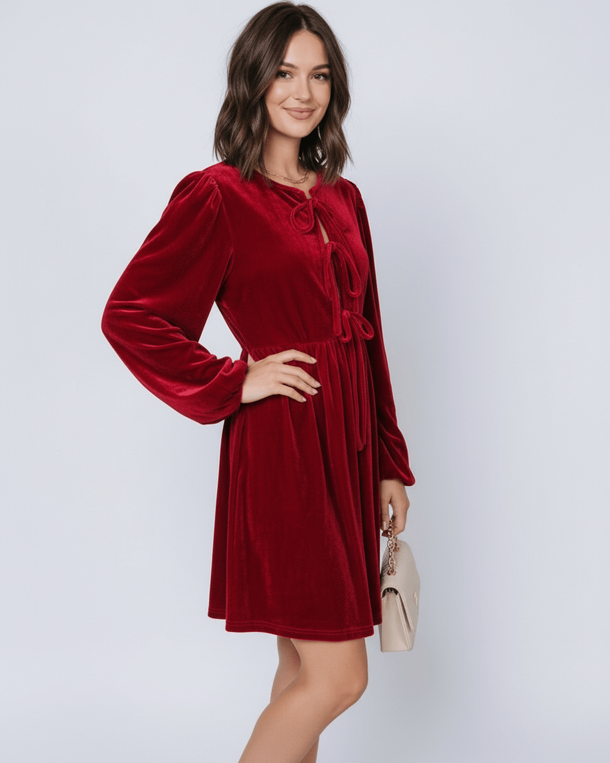 Ruby Mini Dress by Lauven—elegant red velvet dress with lantern sleeves and flowing skirt.