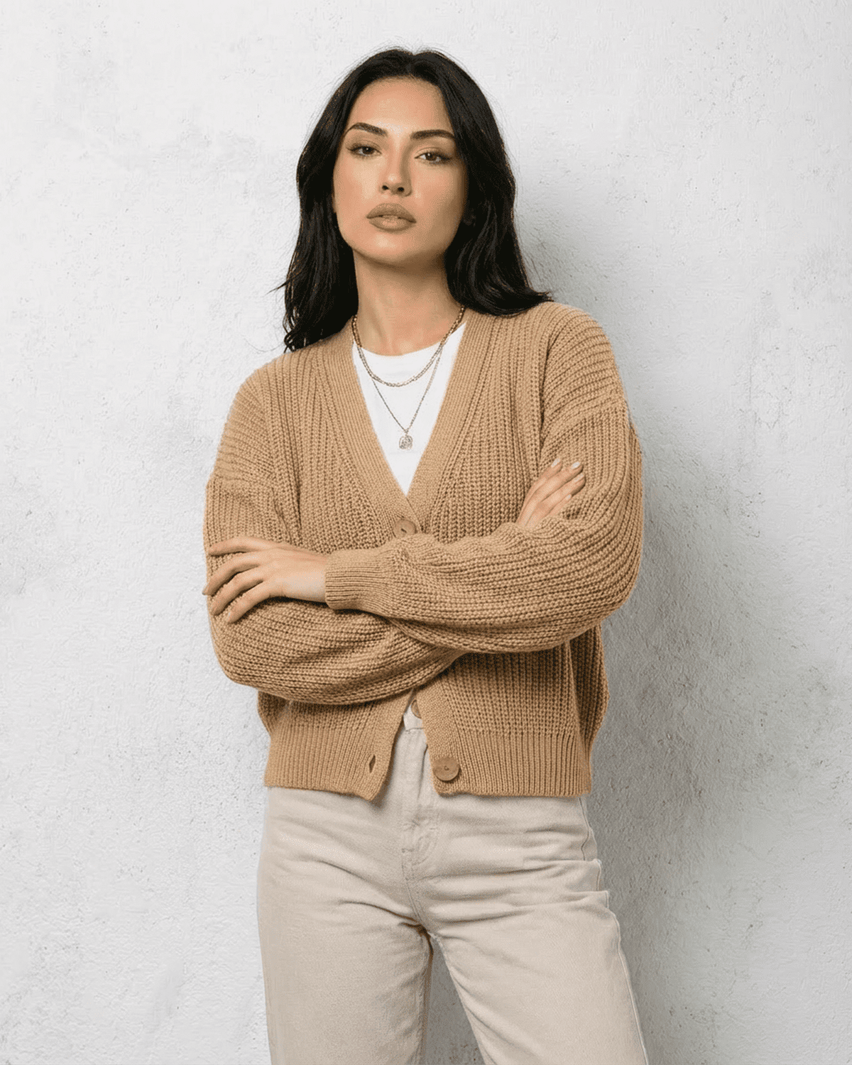 Lauven Saffron Cardigan in beige, featuring a relaxed V-neck silhouette and cozy knit design.
