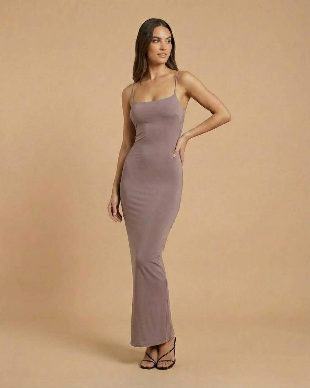 Sahara Maxi Dress by Lauven in soft taupe with delicate spaghetti straps and minimal backless design.