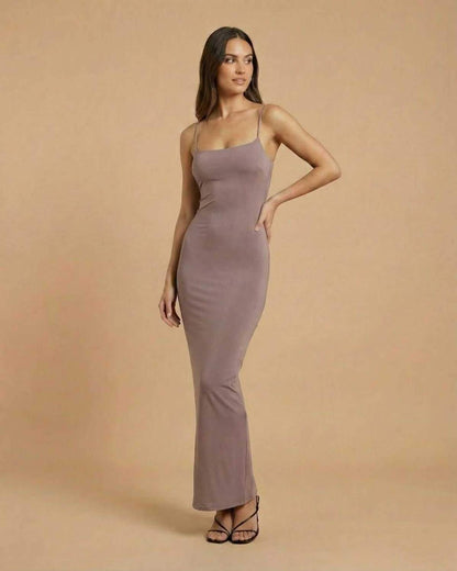 Sahara Maxi Dress by Lauven in soft taupe with delicate spaghetti straps and minimal backless design.