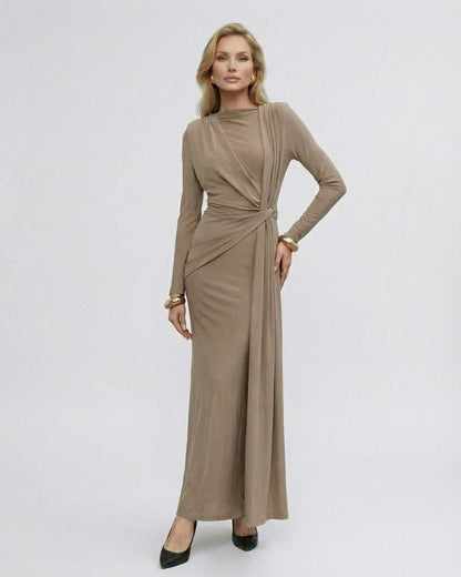 Sahara Maxi Dress in taupe, featuring long sleeves and draped waist detail by Lauven, combining elegance with comfort.