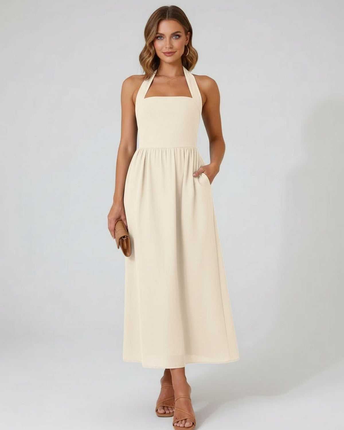 Sahara Midi Dress – Beige Halter A-Line Midi Dress by Lauven, featuring a structured neckline and flowing skirt.