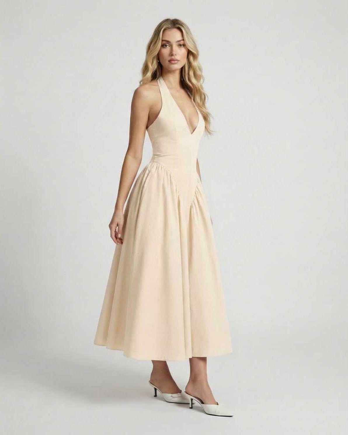 Sahara Midi Dress in beige, featuring a halter neck and elegant backless design by Lauven.