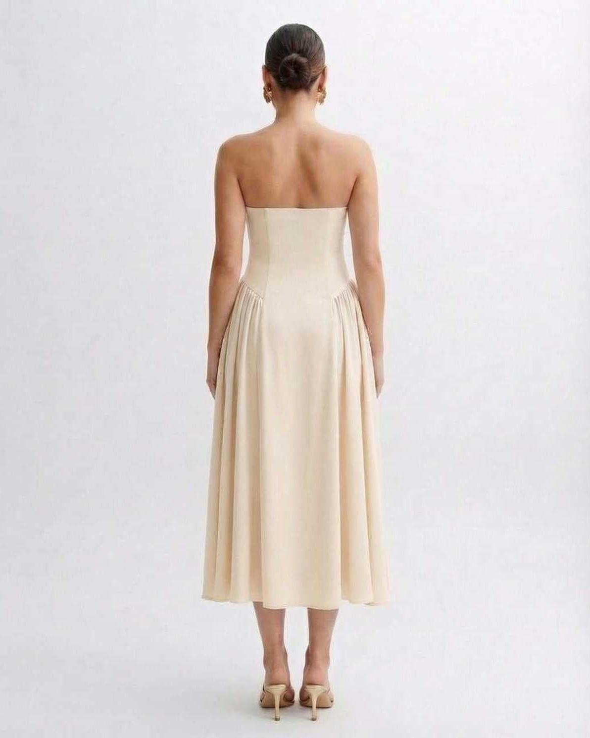Sahara Midi Dress - Beige strapless dress with pleated skirt, embodying elegance and grace by Lauven.