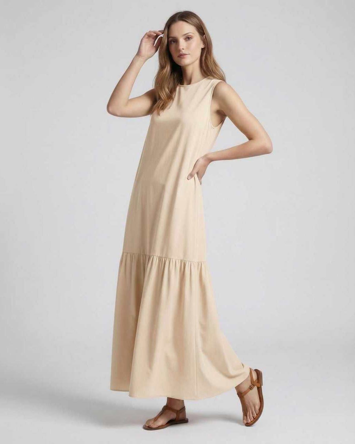 Sahara Midi Dress in soft beige, sleeveless design with a relaxed fit, perfect for casual summer style by Lauven.