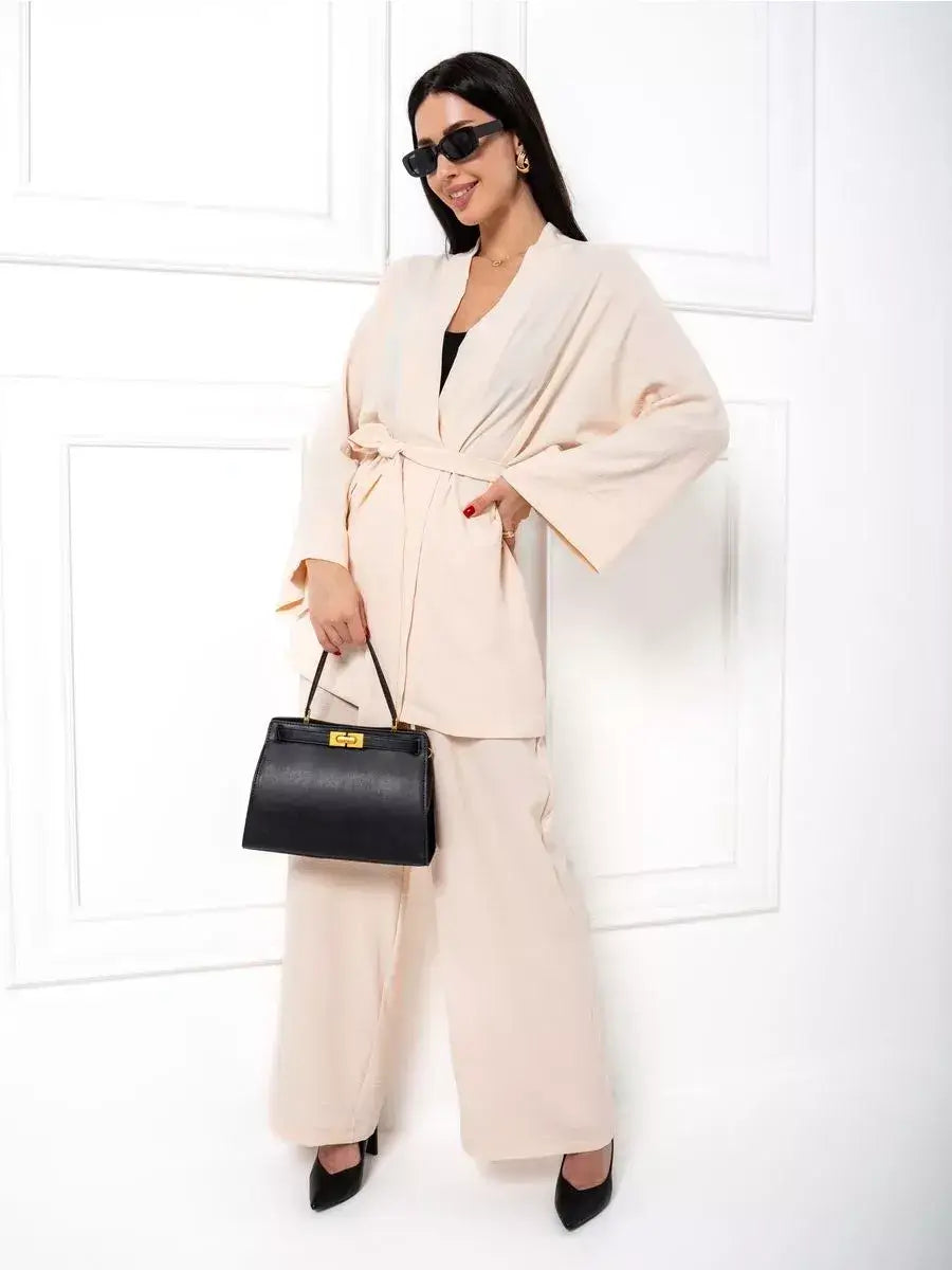 Sahara Suit Set by Lauven - Luxurious beige oversized two-piece set featuring wide-leg trousers and a stylish belt.