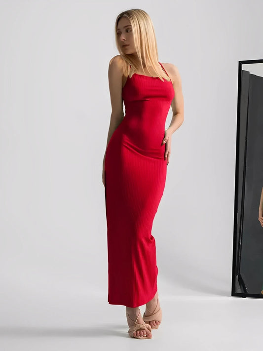Scarlet Lace Midi Dress in red, featuring a strappy bodycon silhouette and side slit, perfect for standout party moments.
