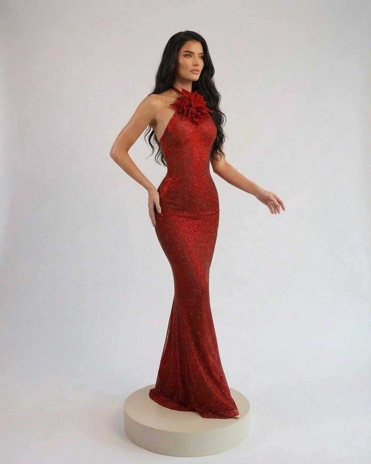 Scarlet Maxi Dress by Lauven, featuring a halter neck and floral detail in a rich red tone.