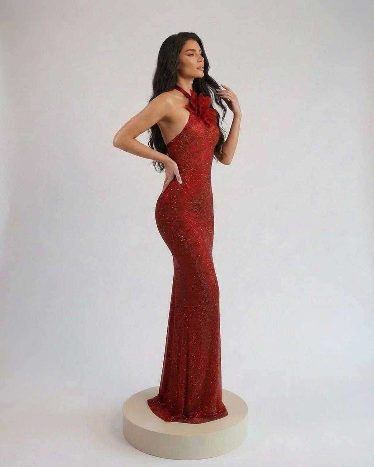 Scarlet Maxi Dress by Lauven featuring a halter neck design and floor-length silhouette in rich red shimmer.
