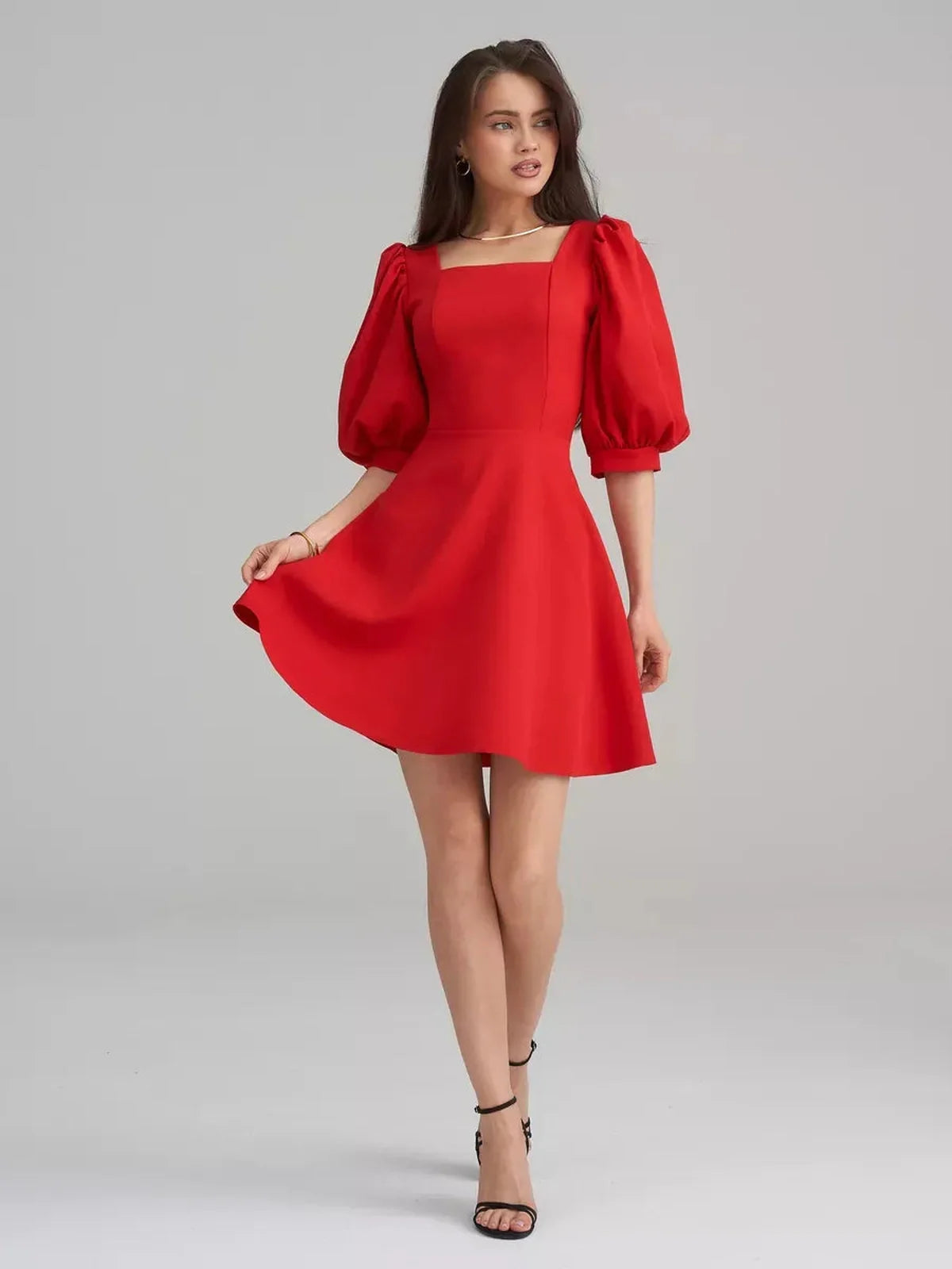 Scarlet Muse Red Mini Dress featuring square neckline, puff sleeves, and flared skirt, perfect for elegant occasions.