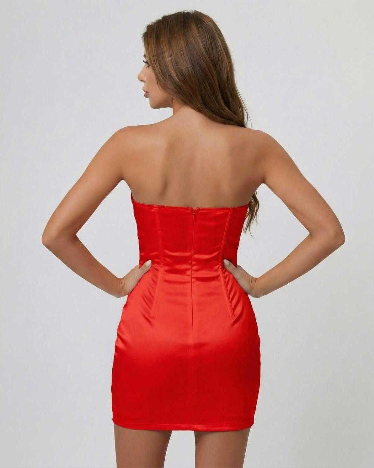 Back view of a model wearing the Scarletia Mini Dress by Lauven, showcasing its strapless satin-effect design and structured fit.