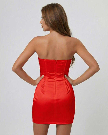 Back view of a model wearing the Scarletia Mini Dress by Lauven, showcasing its strapless satin-effect design and structured fit.