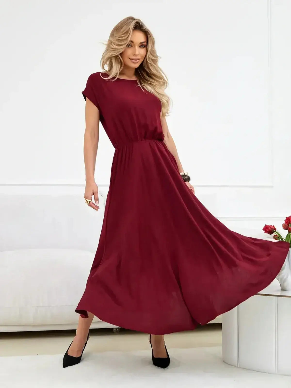 Sculpted Ease Maxi Dress in deep burgundy, featuring a cinched waist and flowing skirt, perfect for summer and formal occasions.