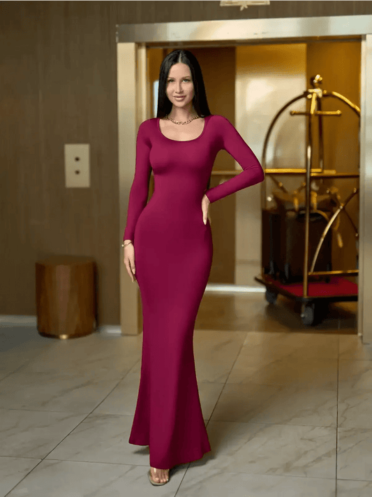 Long sleeve red dress showcasing a sleek, body-hugging fit, perfect for formal events or evening occasions.