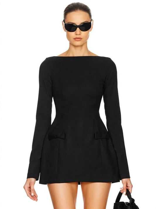 Sculpted Grace black mini dress with long sleeves and a sculptural silhouette, perfect for parties or weddings.