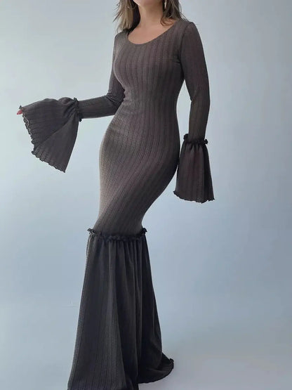 Sculpted Grace Maxi Dress in chocolate brown featuring flared sleeves and a dramatic fishtail hem for evening elegance.