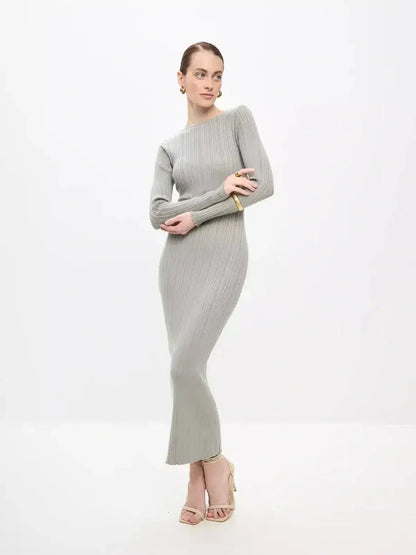 Sculpted Grace Maxi Dress by Lauven in soft ribbed fabric, featuring a sculptural fit and elegant long sleeves.