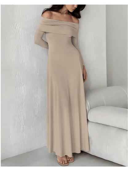 Model wearing a cappuccino-toned off-shoulder maxi dress, showcasing its elegant and sculpting fit.