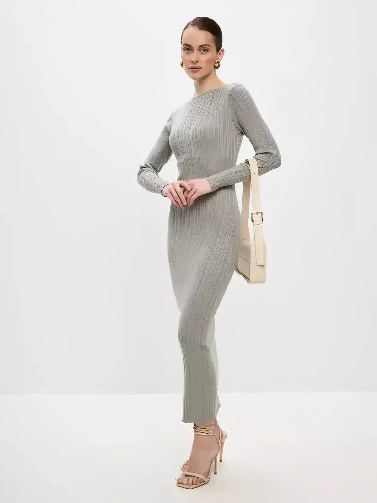 Sculpted Grace Maxi Dress by Lauven, showcasing a ribbed knit design with long sleeves in a sophisticated light grey.
