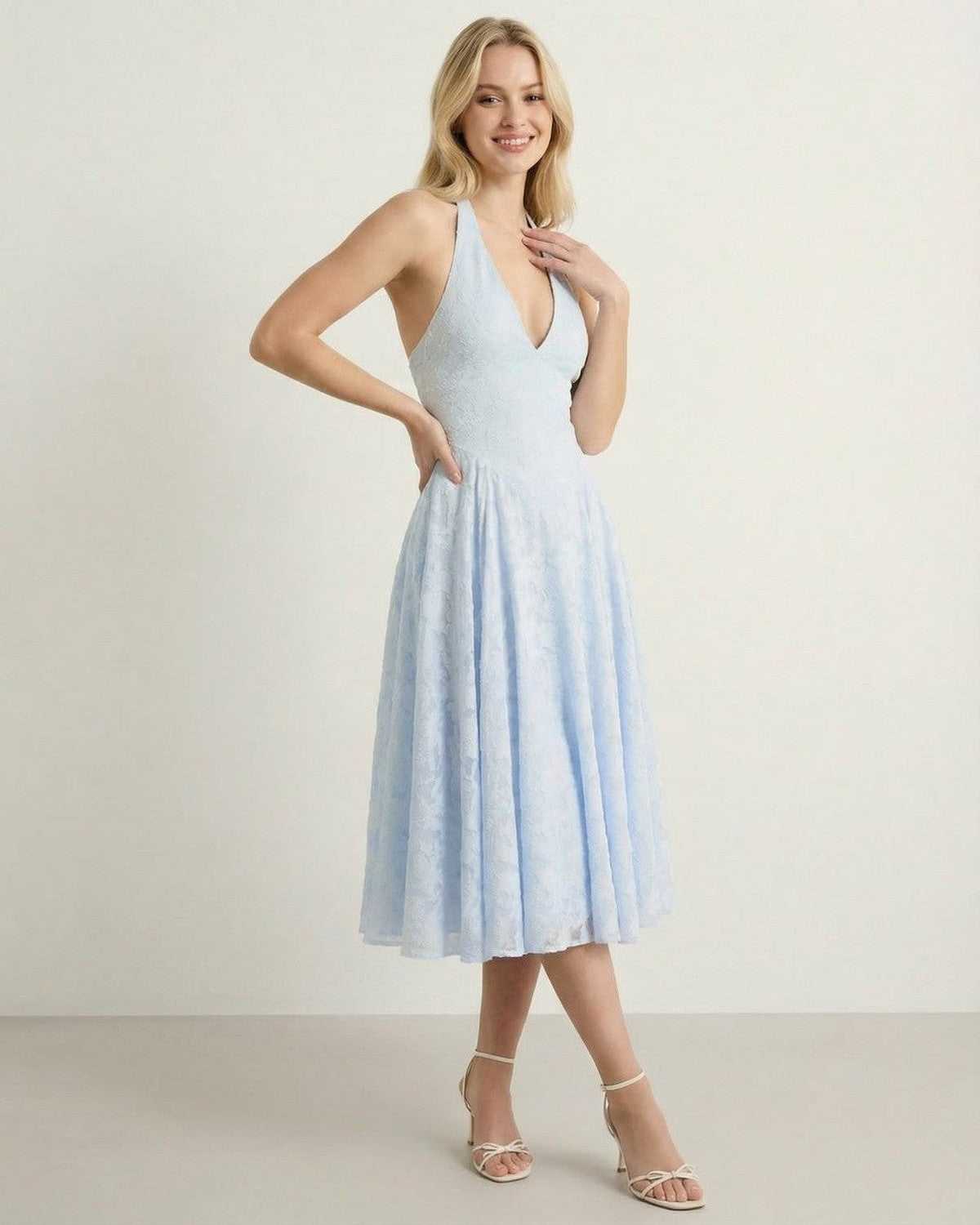 Selene Midi Dress by Lauven in light blue, elegant A-line silhouette with a halter neck design.