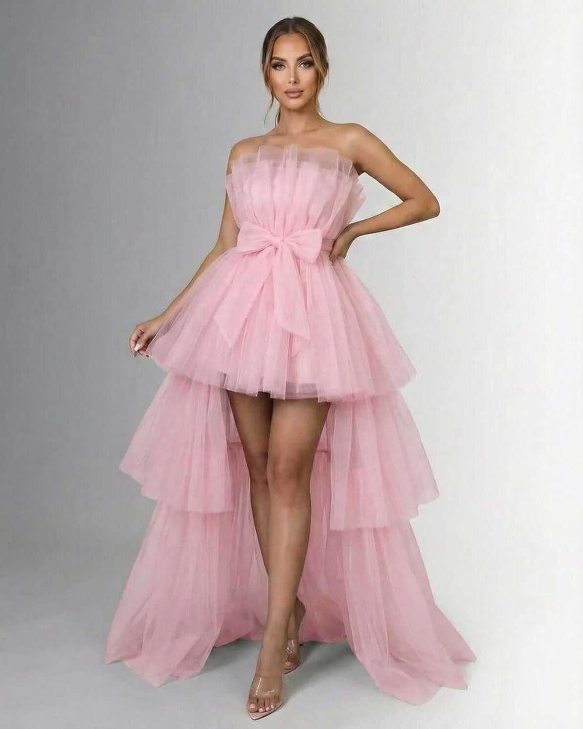 Seraphina Maxi Dress by Lauven, elegant pink tulle strapless gown with high-low design and bow embellishment.