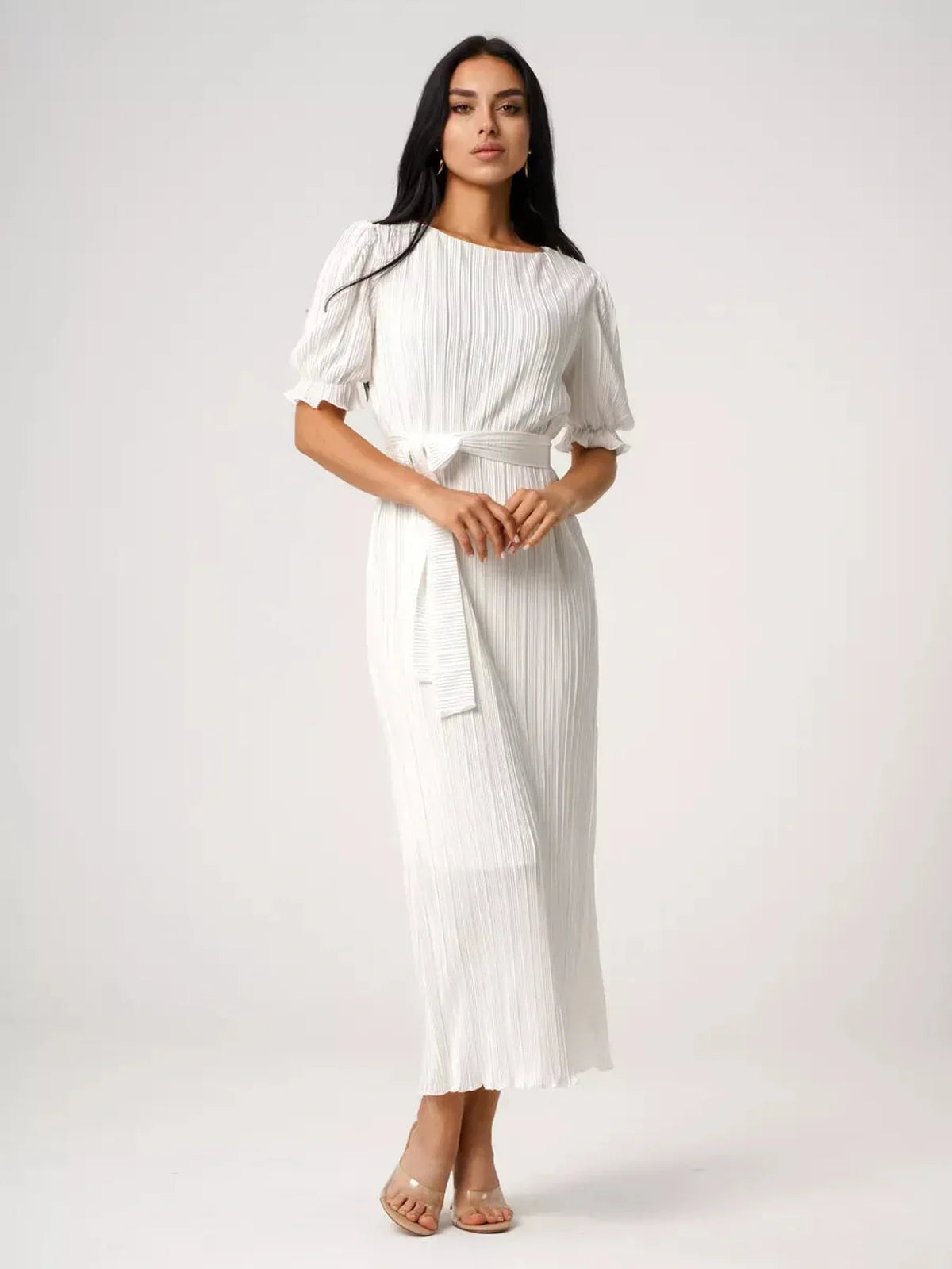 Elegant Seraphine Maxi Dress in white, featuring pleated design and refined silhouette, perfect for summer occasions.