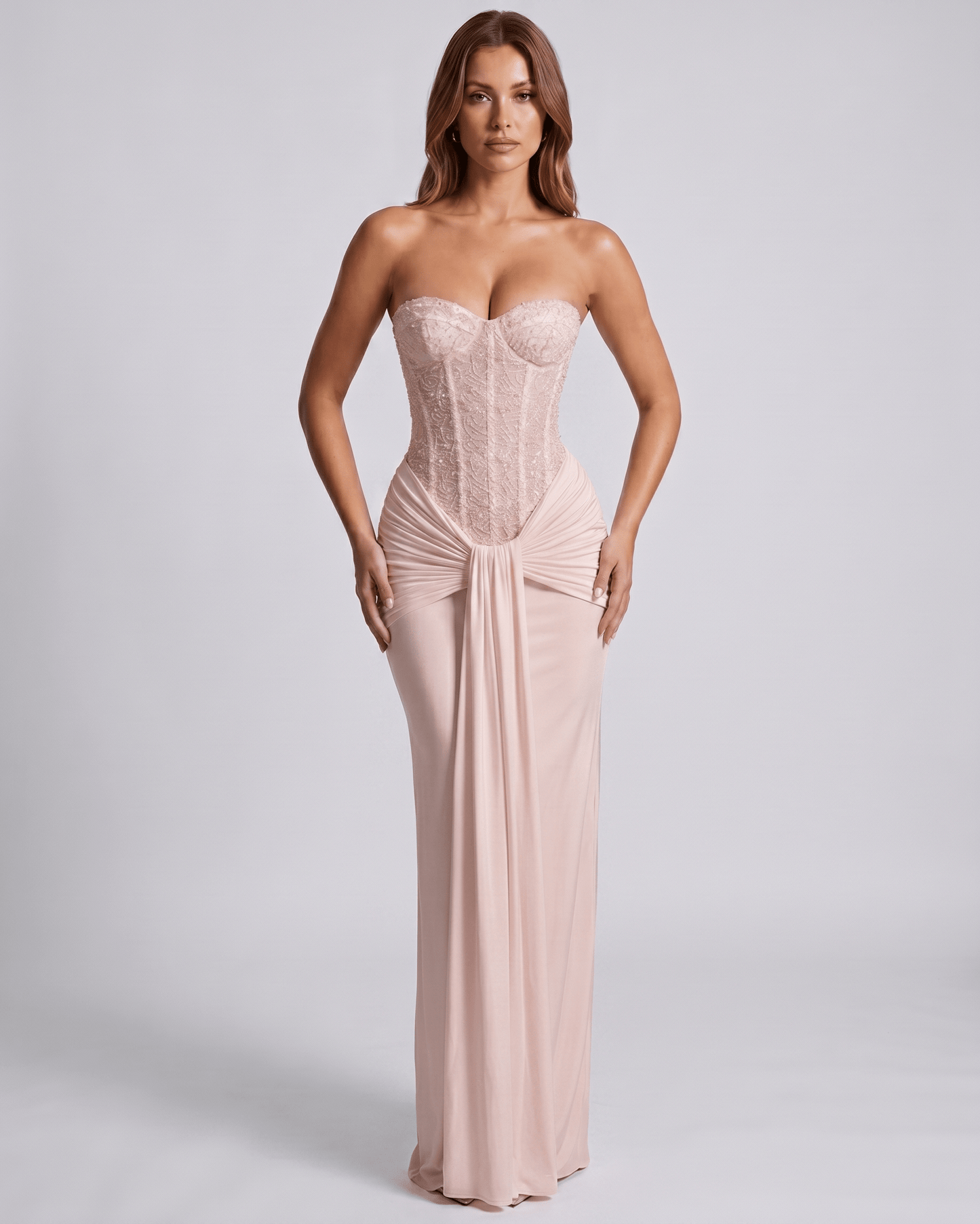 Serelisse Maxi Dress featuring off-the-shoulder design, structured corset bodice, and soft stretch material by Lauven.