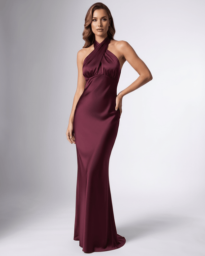 Burgundy satin maxi dress by Lauven, featuring a halter neck and elegant satin finish, perfect for formal occasions.