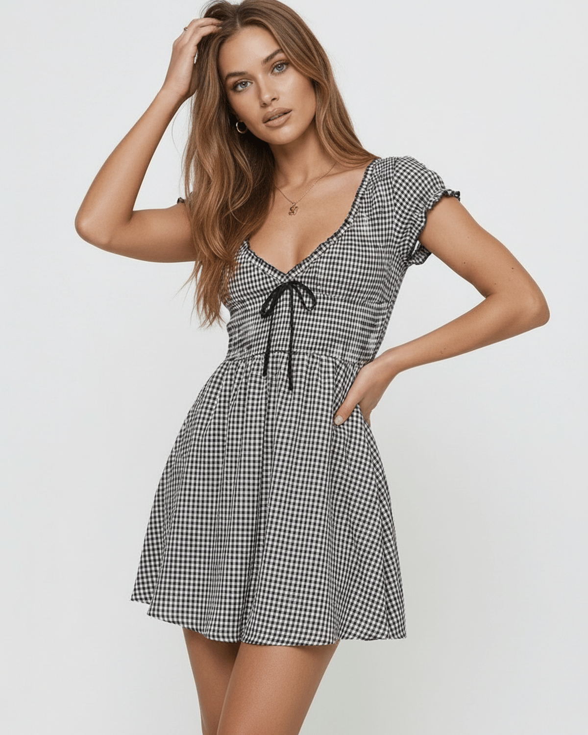 Seren Mini Dress by Lauven featuring elegant gingham check, V-neck, and empire waist design.