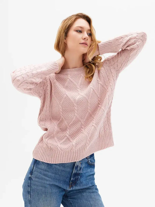Seren Sweater by Lauven in powder pink, featuring cable knit sleeves and textured knit design.