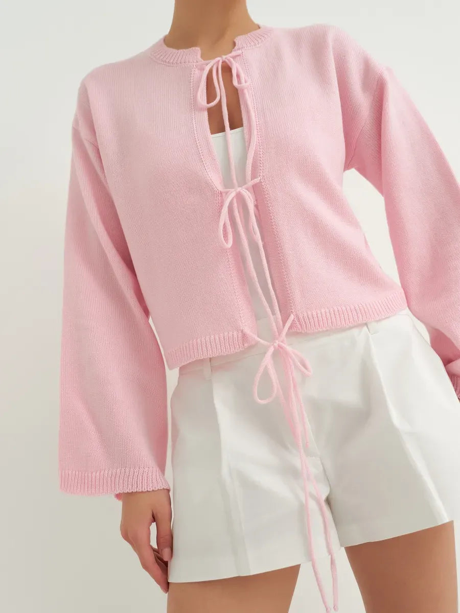Serena Cardigan by Lauven in soft powder pink, lightweight summer knitwear perfect for warm weather.