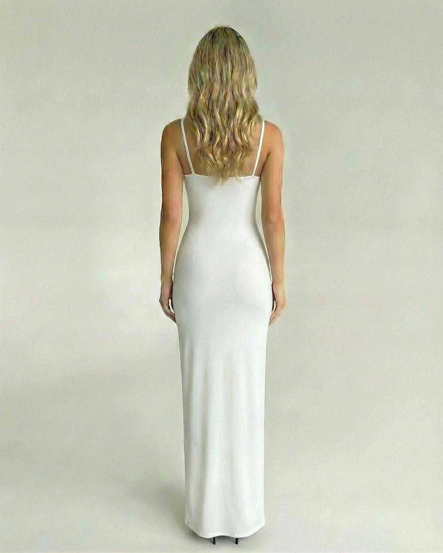 Back view of Serena Maxi Dress by Lauven, featuring elegant fit and smooth white fabric.