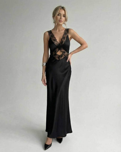 Lauven Serena Maxi Dress featuring a sleek black design with lace detailing, V-neck and elegant silhouette.