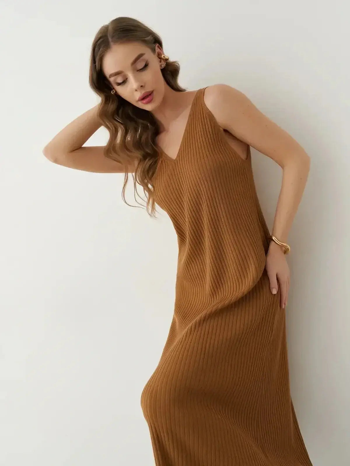 Sleeveless Serena Maxi Dress in ribbed knit, featuring a flattering V-neckline and elegant flow for versatile styling.