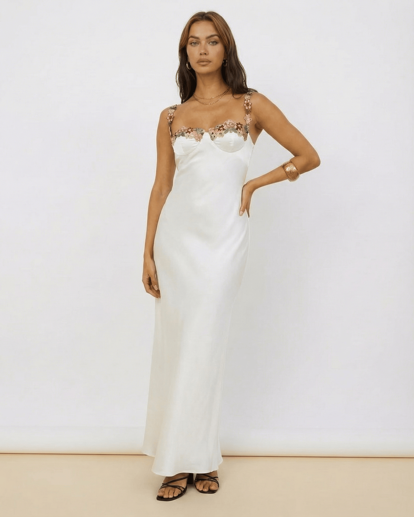 Serena Maxi Dress – White satin dress with floral embroidery, embodying elegance by Lauven.