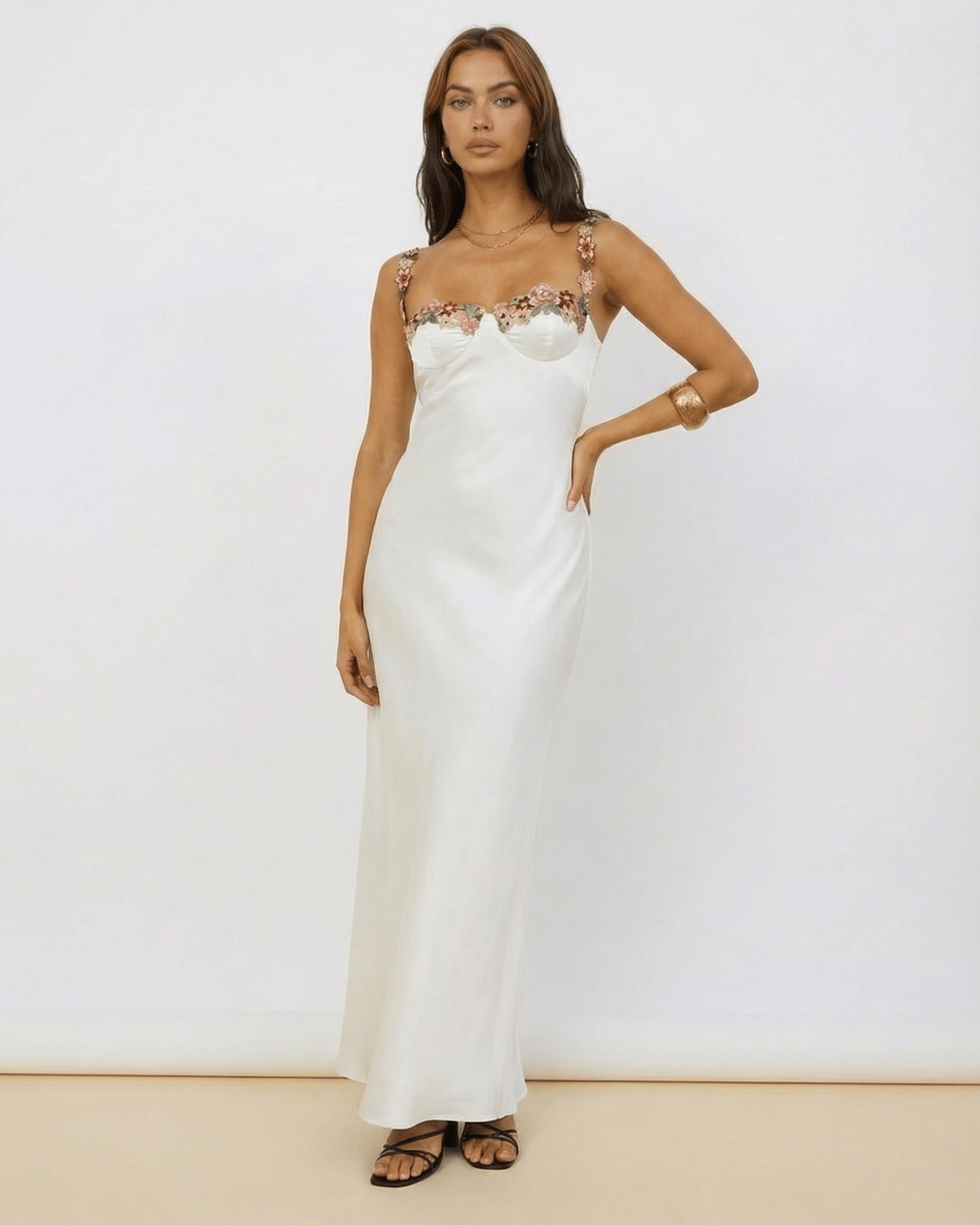 Serena Maxi Dress – White satin dress with floral embroidery, embodying elegance by Lauven.